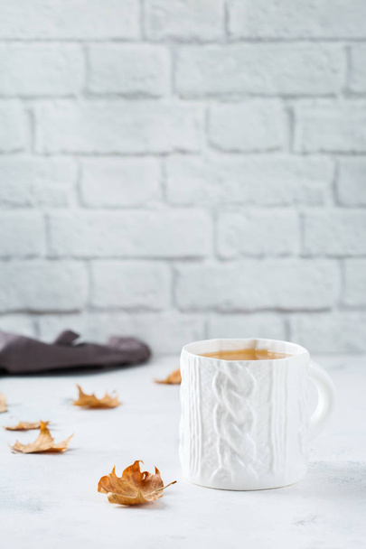 Food and drink, still life concept. Big white mug with hot tea infusion beverage to warm in a cold winter and autumn days. Copy space background - Foto, imagen
