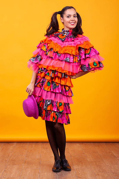 Young beautiful woman wearing a mascarade latino costume - Photo, Image