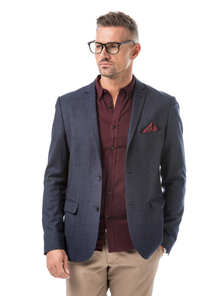 handsome stylish man in eyeglasses and jacket looking away isolated on white - Foto, afbeelding