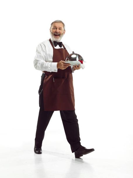 Senior waiter at studio - Фото, изображение