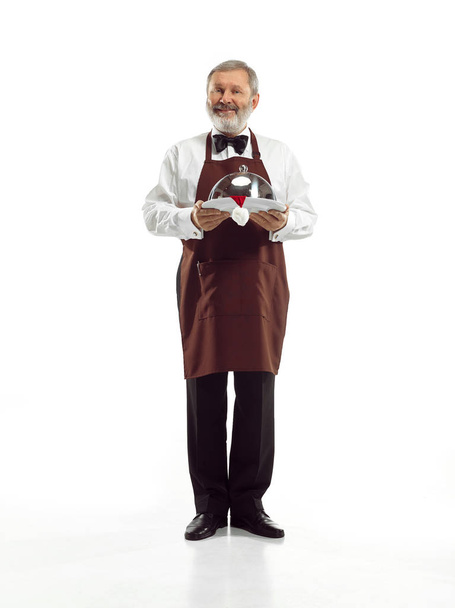 Senior waiter at studio - Foto, Imagen