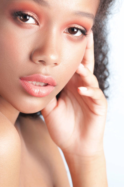 Young beautiful black girl with clean perfect skin close-up. Beauty portrait - Fotoğraf, Görsel