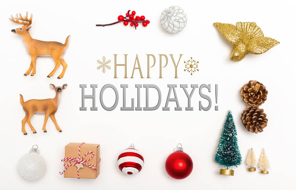 Happy holidays message with Christmas ornaments - Valokuva, kuva