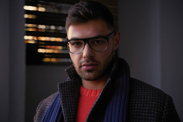 portrait of handsome young man in stylish eyeglasses posing  - Фото, зображення