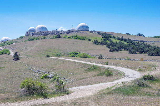 Republic of Crimea. 06/13/2018: Military radar station on the top of Perepelina Mountain, Ai-Petri plateau - Fotografie, Obrázek