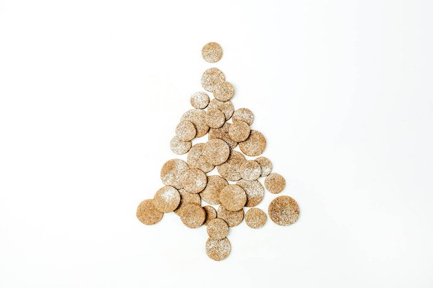 Christmas tree made of gingerbread cookies on white background. Flat lay, top view. - Photo, image