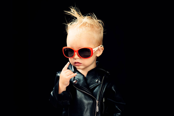 Rock music is in my soul. Rock style child. Little child boy in rocker jacket and sunglasses. Little rock star. Rock and roll fashion trend. Adorable small music fan. Music for children - 写真・画像
