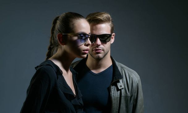 One and only. Couple in love. Fashion models in trendy sun glasses. Couple of man and woman wear fashion glasses. Love relations. Friendship day. Friendship relations. Endearing geekiness - 写真・画像