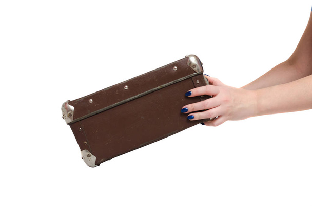 Retro suitcase and female hands isolated on the white background. - Fotografie, Obrázek