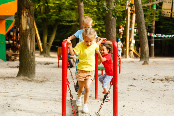 children on playground in the park - Fotoğraf, Görsel