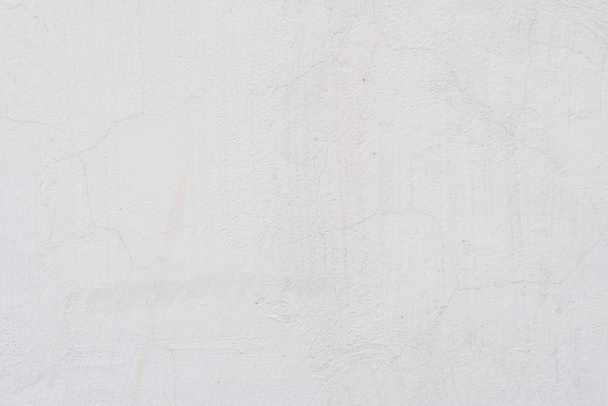 Θραύσμα τοίχου με γρατσουνιές και ρωγμές. Μπορεί να χρησιμοποιηθεί ως φόντο - Φωτογραφία, εικόνα