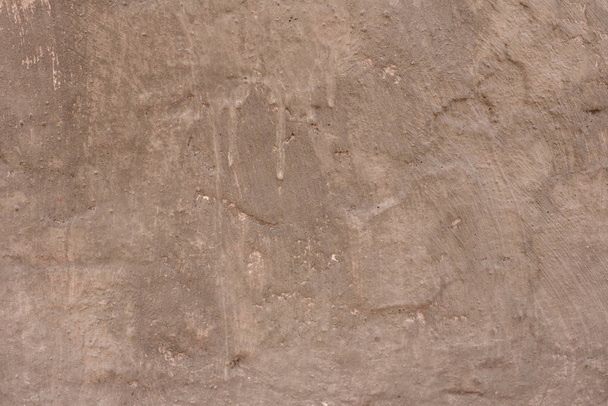 Wall fragment with scratches and cracks. It can be used as a background - Photo, image