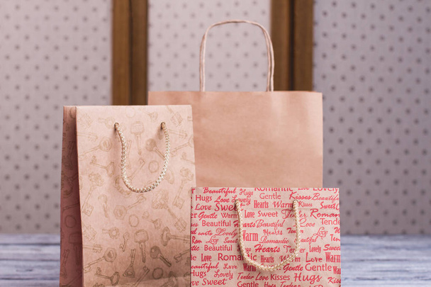 Close up kraft paper shopping bags with handles. - Photo, Image