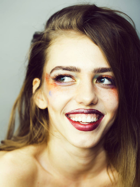 Girl with orange makeup closeup - Фото, зображення
