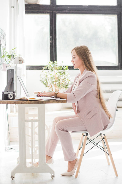 Young business woman working at home. Creative Scandinavian style workspace - Fotoğraf, Görsel