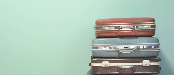 Vintage suitcase for travel for background - 写真・画像