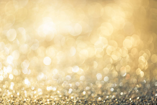 glitter gold bokeh Colorfull Blurred abstract background for birthday, anniversary, wedding, new year eve or Christmas. - Fotografie, Obrázek