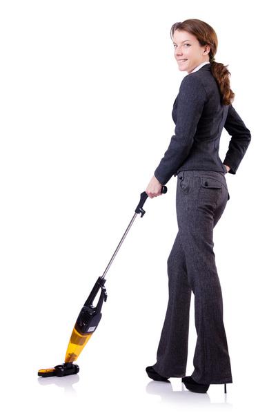 Young woman with vacuum cleaner on white - Fotografie, Obrázek