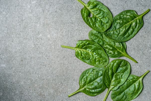 Top view of green fresh spinach leaves  - Photo, Image