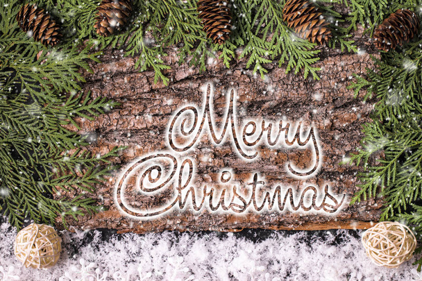    MERRY CHRISTMAS handwritten inscription. Winter holiday composition. New Year and Christmas celebration. Winter holidays concept. Christmas decorations. Top View. - Фото, зображення
