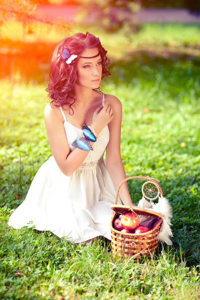 Beautiful woman on picnic on nature. Beautiful Young girl Outdoors. Enjoy Healthy Smiling Girl. - 写真・画像