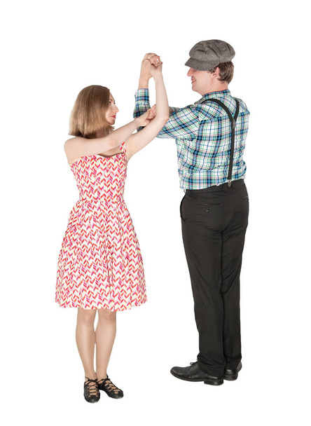Beautiful couple dancing country dance isolated on white - 写真・画像
