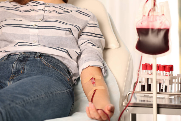 Woman making blood donation at hospital, closeup - Foto, Imagen