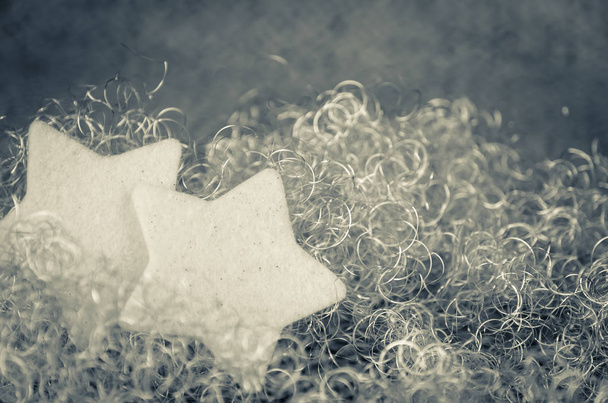 white christmas stars in shining golden background - Photo, Image