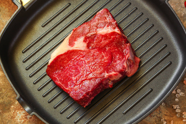 beef steak Grilled with spices (piece of meat). Top view with copy space - 写真・画像