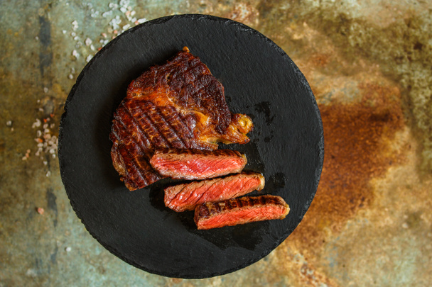 beef steak Grilled with spices (piece of meat). Top view with copy space - Photo, Image