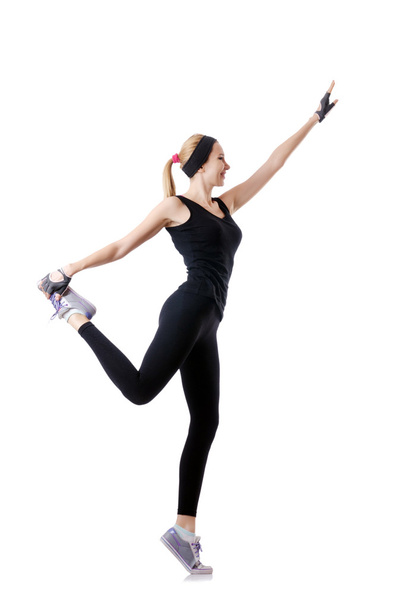 Young female doing exercises - Фото, изображение
