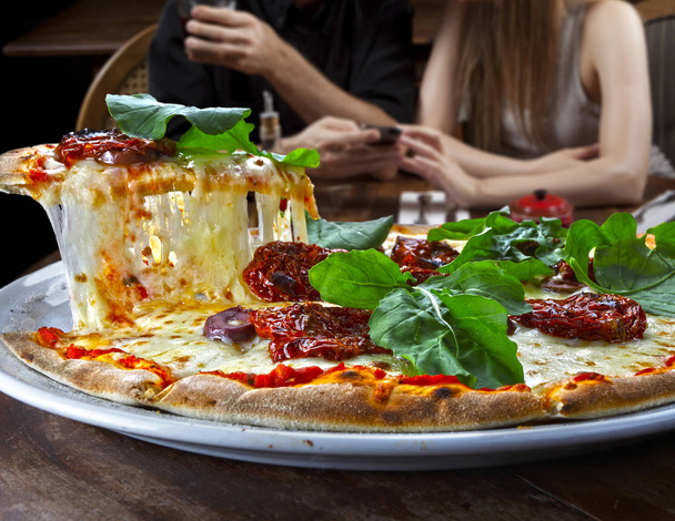 Pizza slice melted cheese - Fotoğraf, Görsel