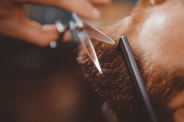 Barber beard styling and cut process - Фото, зображення