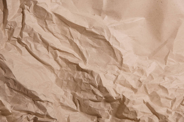Crumpled kraft paper. Trendy hipster background. Space for your text - Valokuva, kuva