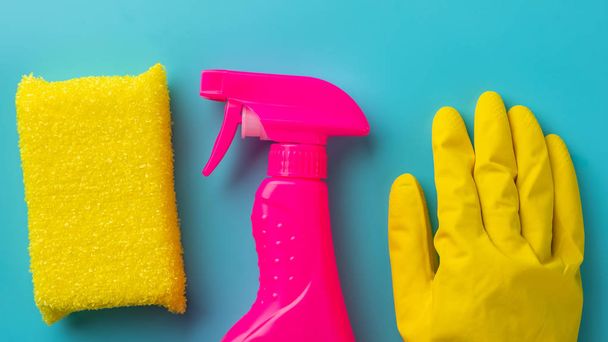 cleaning on blue background. Cleaning or housekeeping concept background. Flat lay, Top view. - Fotografie, Obrázek