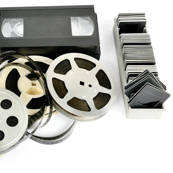 Old photo and video equipment isolated on white background. Retro storage media. Free space for text. - 写真・画像