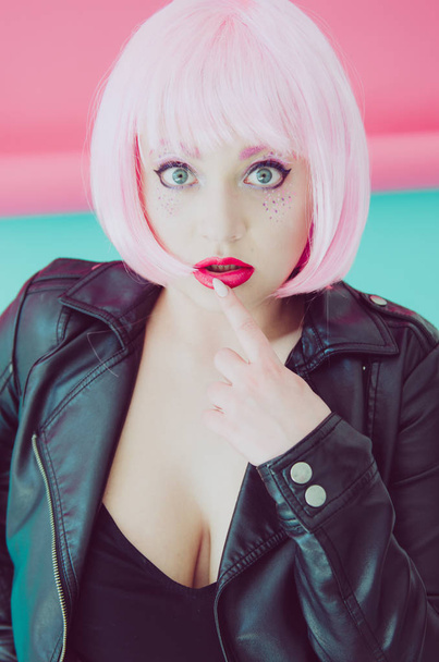 Portrait of young sensual woman with pink hair and red lipstick  - Foto, afbeelding