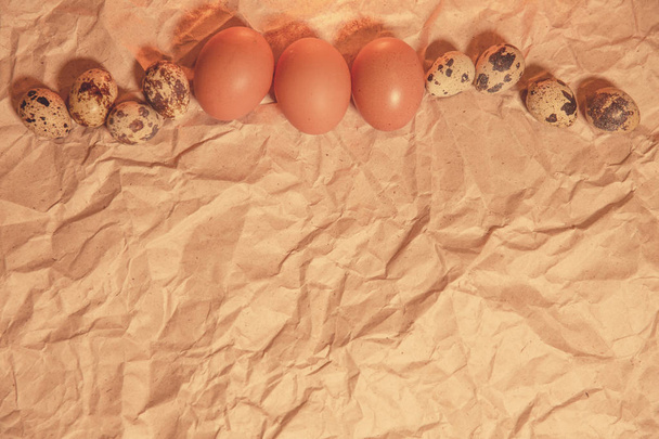 Easter eggs  on crumpled  kraft paper - Fotó, kép