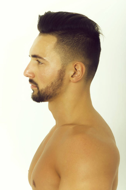Handsome bearded man posing in profile - Foto, imagen