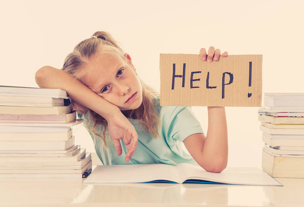 Frustrated little schoolgirl feeling a failure unable to concentrate in reading and writing difficulties learning problem attentional disorders special needs and low academic performance concept. - Foto, Bild