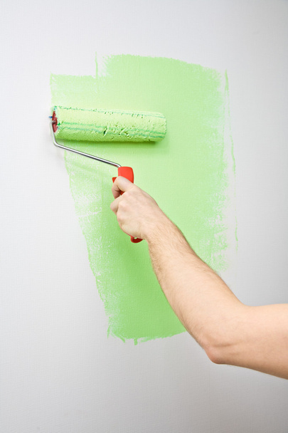 Painting the wall with roller - Photo, Image