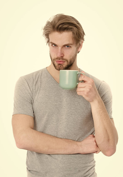 man drink from coffee or tea cup - Fotó, kép