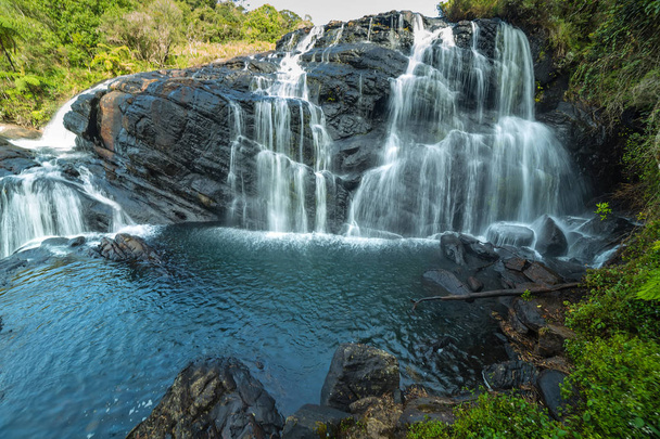 stream of waterfall with clear water, stone Baker's Falls in the Horton Plains National Park, Sri Lanka. - Photo, Image