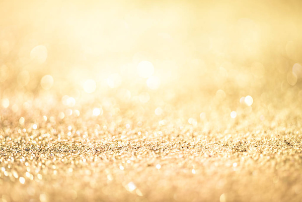 glitter gold bokeh Colorfull Blurred abstract background for birthday, anniversary, wedding, new year eve or Christmas. - Photo, Image