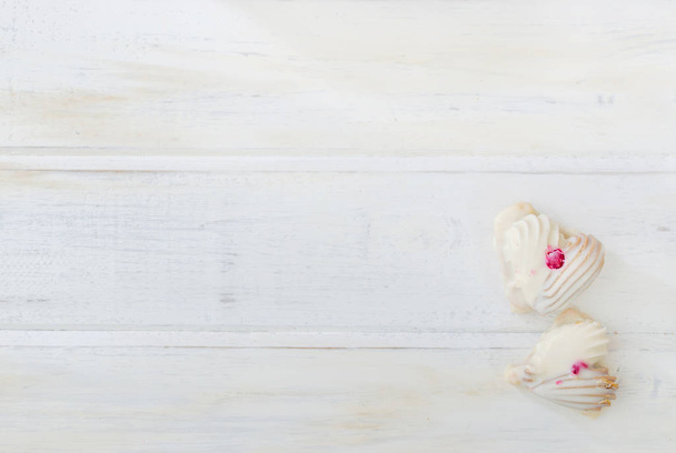 Couple of cookies on white wooden board. Heart shape. Valentine conception. - Φωτογραφία, εικόνα