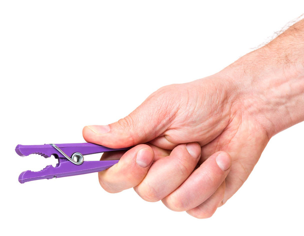 Hand with color clothespin - Photo, Image
