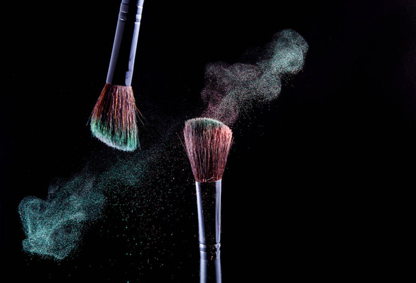 Makeup brush on black background - Photo, Image