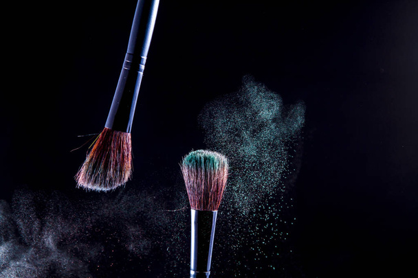 Makeup brush on black background - Foto, immagini