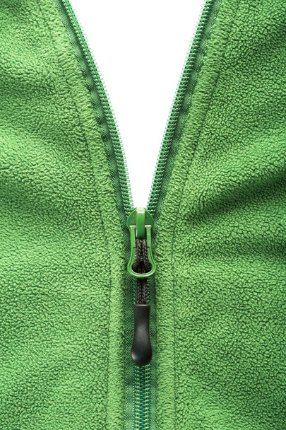 Vetoketju avaaminen fleece takki
 - Valokuva, kuva