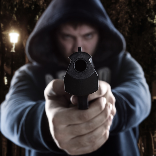 Gangster com arma
 - Foto, Imagem